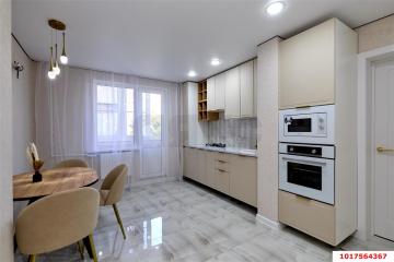 Фото №1: 2-комнатная квартира <span class="whitespace-nowrap">54 м²</span>, <span class="whitespace-nowrap">5/9 эт.</span> - Краснодар, мкр. Завод Измерительных Приборов, ул. имени 40-летия Победы, 35/2