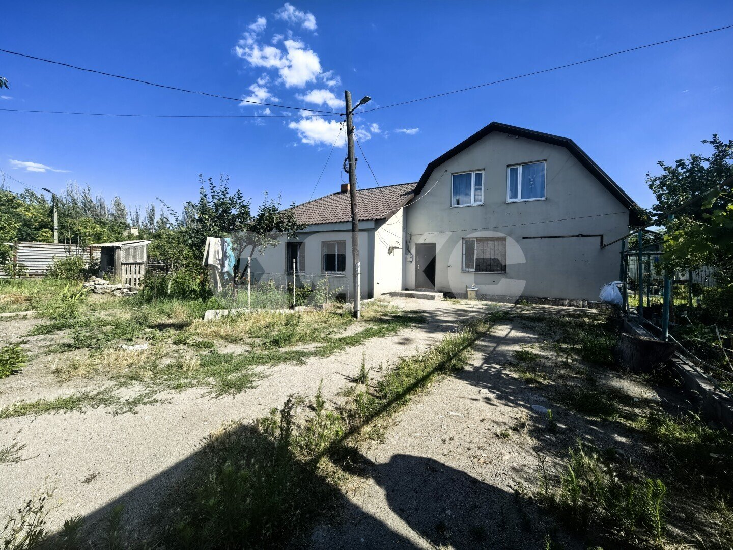Фото №1: Дом <span class="whitespace-nowrap">107 м²</span> <span class="whitespace-nowrap">+ 10 сот.</span>, <span class="whitespace-nowrap">2 эт.</span> - Мариуполь, р. Приморский, пер. Рыбацкий, 4